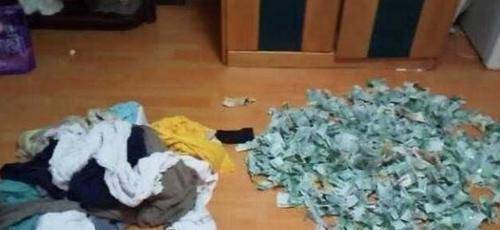 男子将脏衣服丢洗衣机，取衣服时却取出1500万现金(图3)